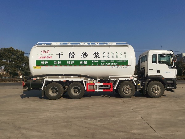 重汽汕德卡8×4油田专用固井水泥罐车|下灰罐车|重晶石粉罐车（单侧管路）