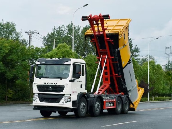 8x4中国重汽HOWO豪沃TX系列SCS5312ZXXZZ6型车厢可卸式垃圾车｜竖直式压缩垃圾箱转运车